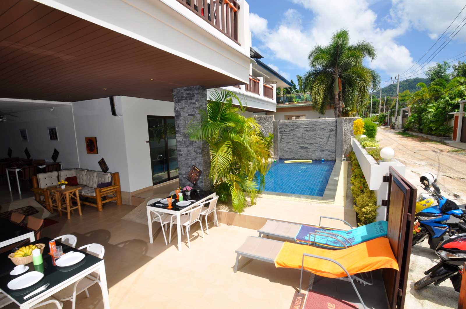 Tropical resort architecture under palm trees