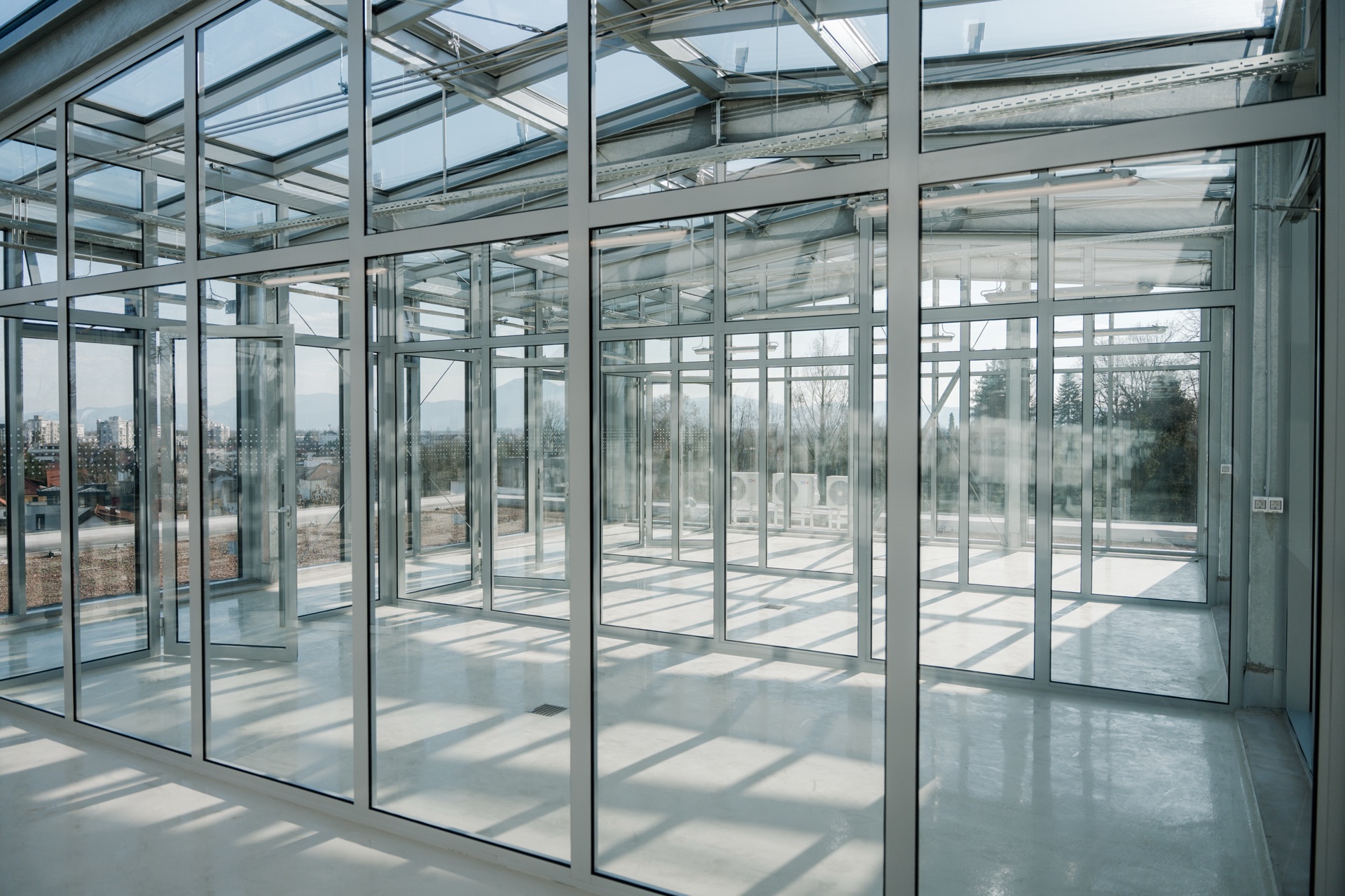 The glazed rooftop interior with steel framing